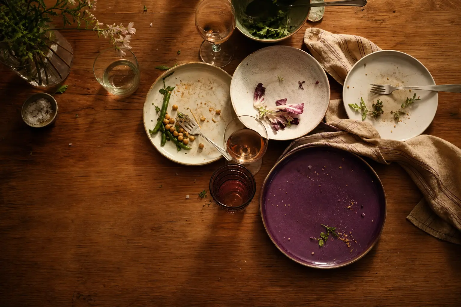 A laid table seen from above after a meal